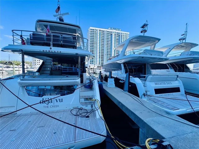a utility room with dryer and baby crib