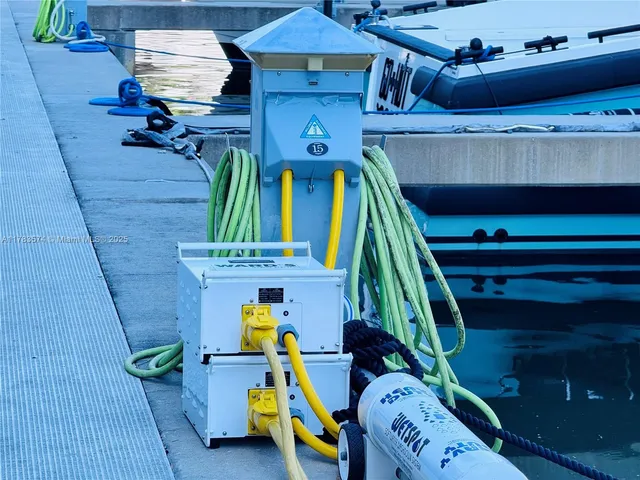 a view of a swimming pool with outdoor seating