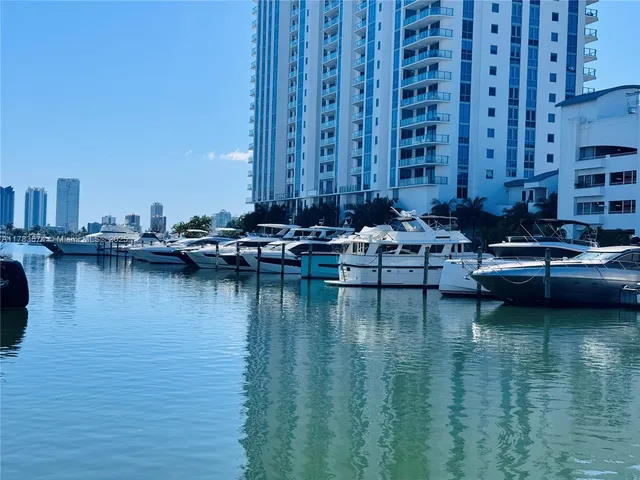 a view of swimming pool with outdoor seating