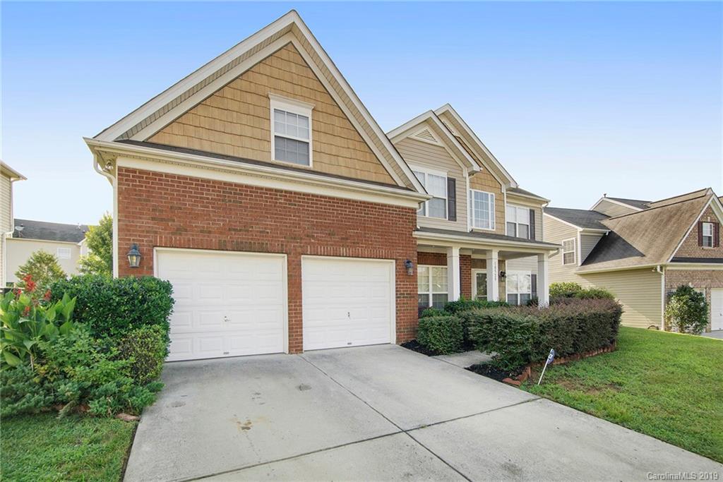 10529 Greenhead View Road Charlotte, NC 28262 - Photo 2 of 32 a front view of a house with a yard