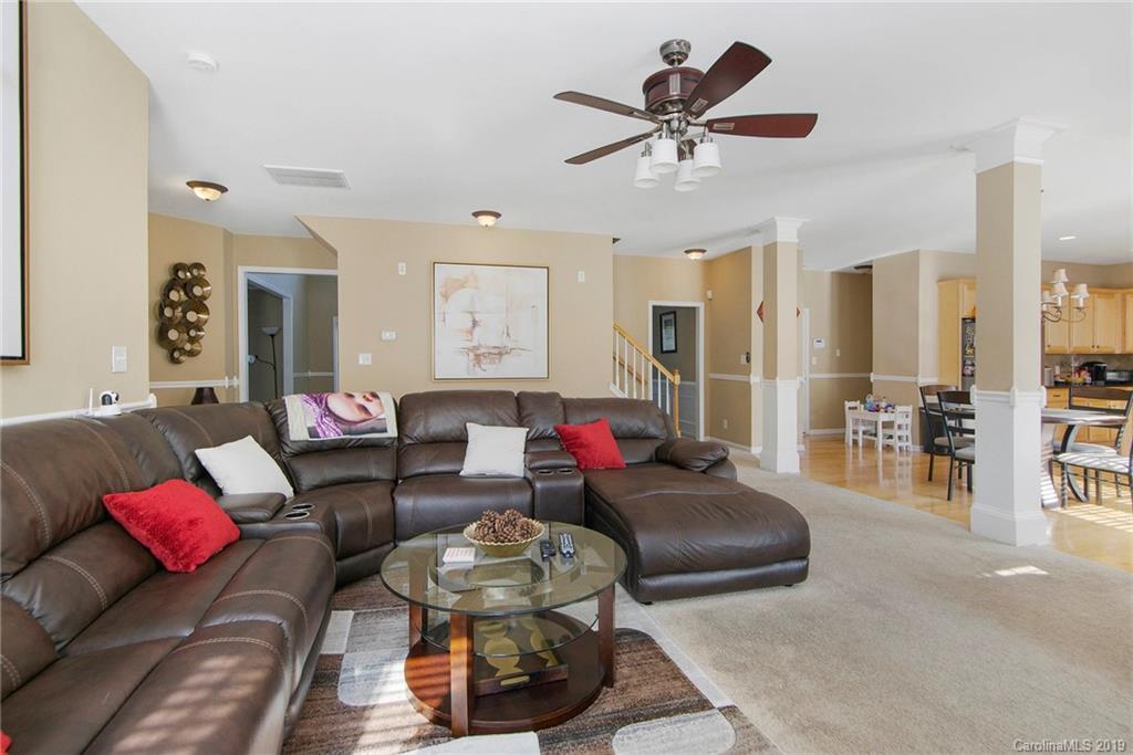 10529 Greenhead View Road Charlotte, NC 28262 - Photo 8 of 32 a living room with furniture and a large window