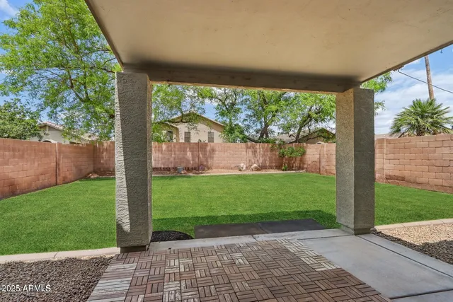 a view of a yard with a porch
