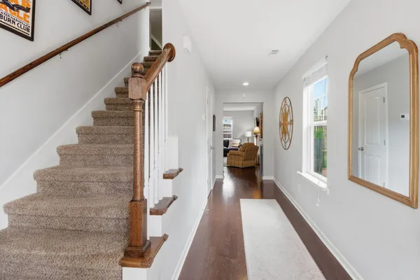 a view of a room with stairs and a couch