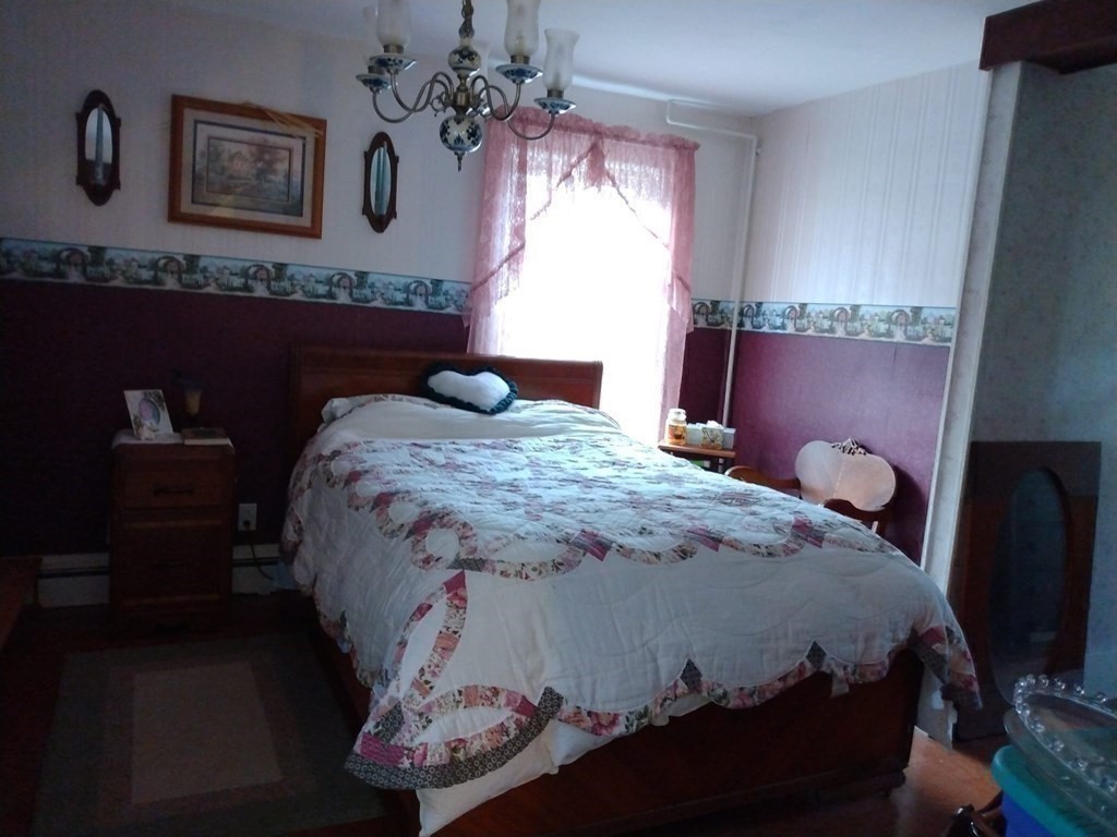 7 Maple Place Winchendon, MA 01475 - Photo 15 of 28 a bedroom with bed and window