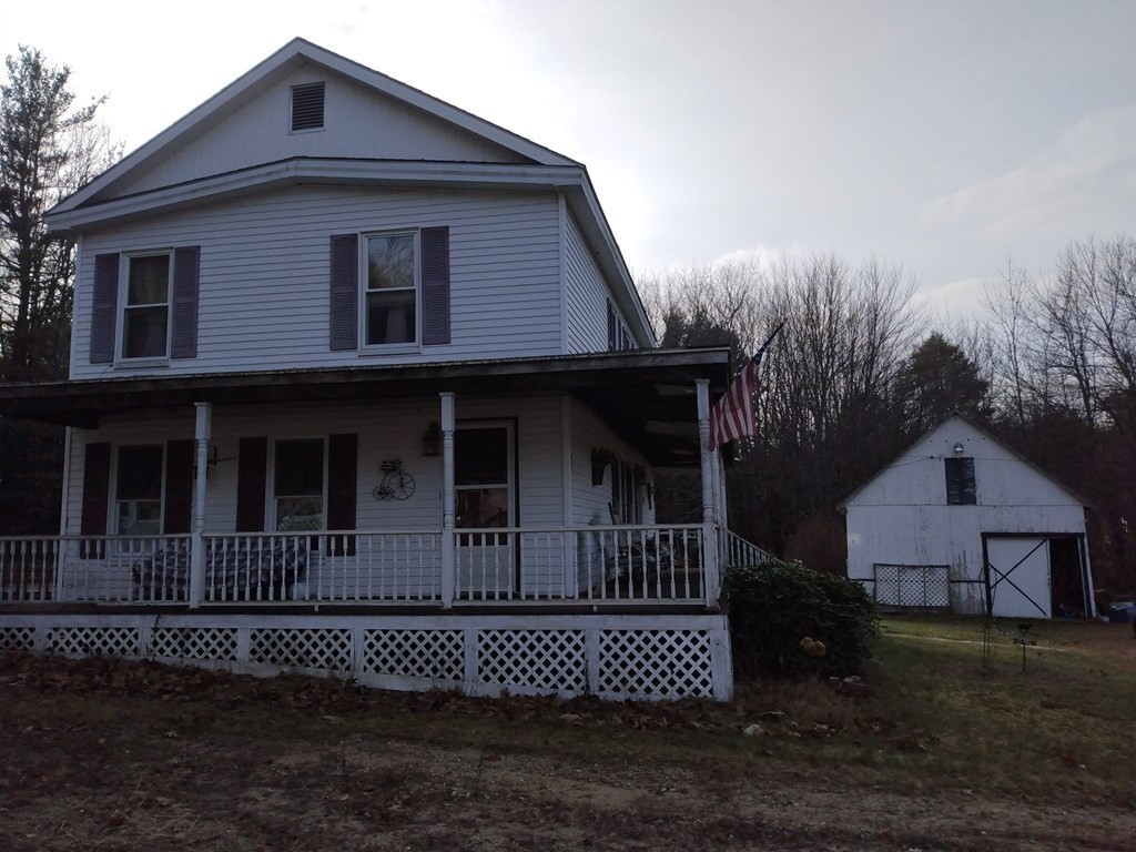 7 Maple Place Winchendon, MA 01475 - Photo 2 of 28 a front view of a house with a yard