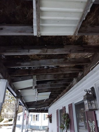 7 Maple Place Winchendon, MA 01475 - Photo 28 of 28 a kitchen with a refrigerator a stove and cabinets