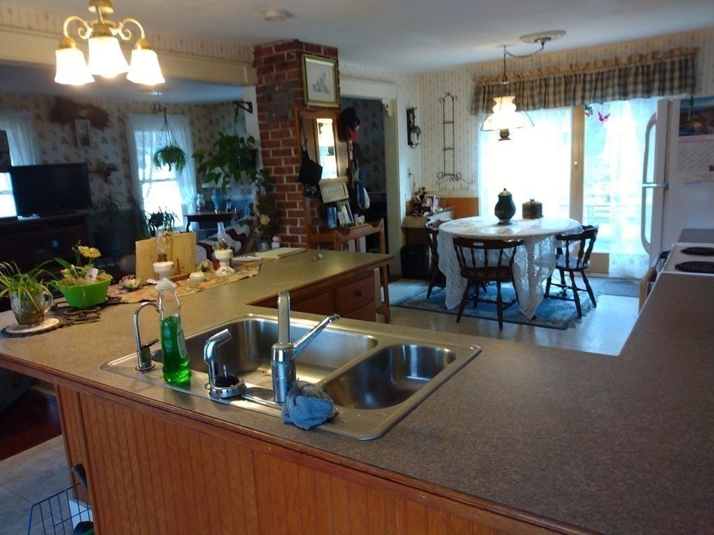 7 Maple Place Winchendon, MA 01475 - Photo 8 of 28 a view of a dining room with furniture window and outside view