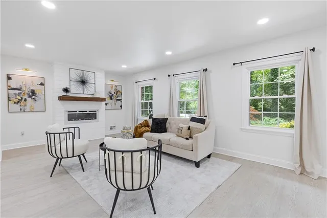 a living room with furniture and a window