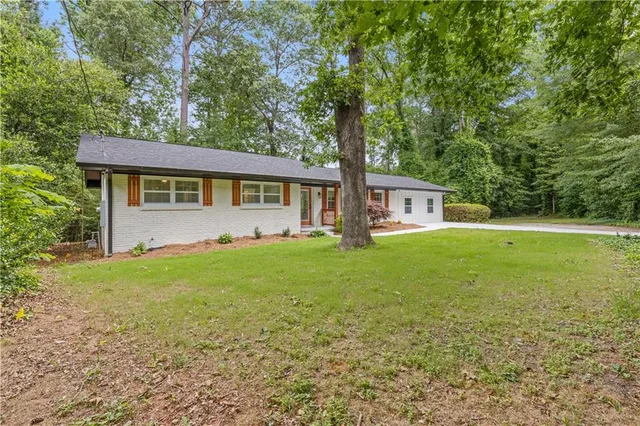 a house view with a garden space