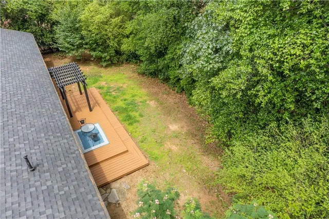 a view of swimming pool with a yard