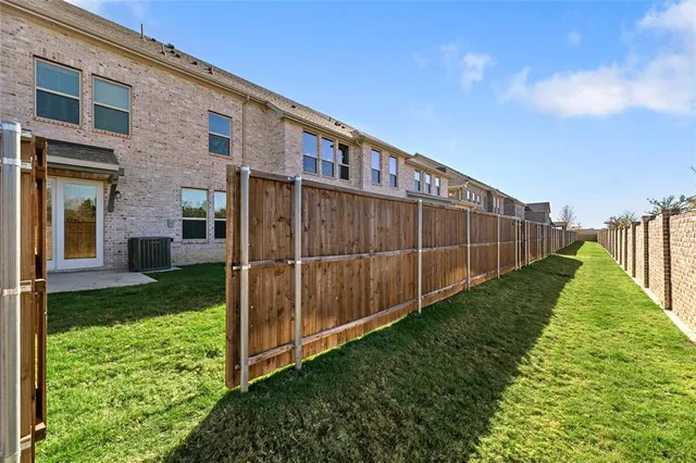 a view of a backyard with a garden