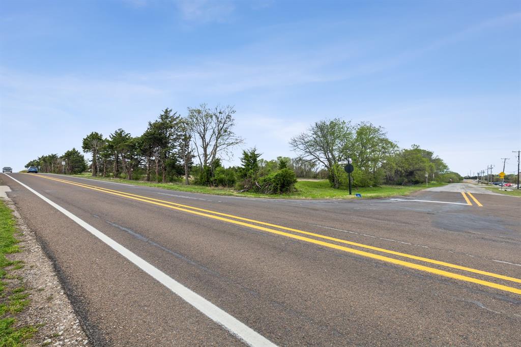 Tbd Old Ridge Road Heath, TX 75032 - Photo 11 of 14 a view of a road with a houses in the background