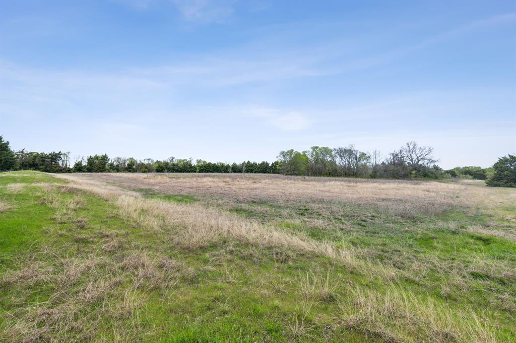 Tbd Old Ridge Road Heath, TX 75032 - Photo 5 of 14 a view of a lake from a yard