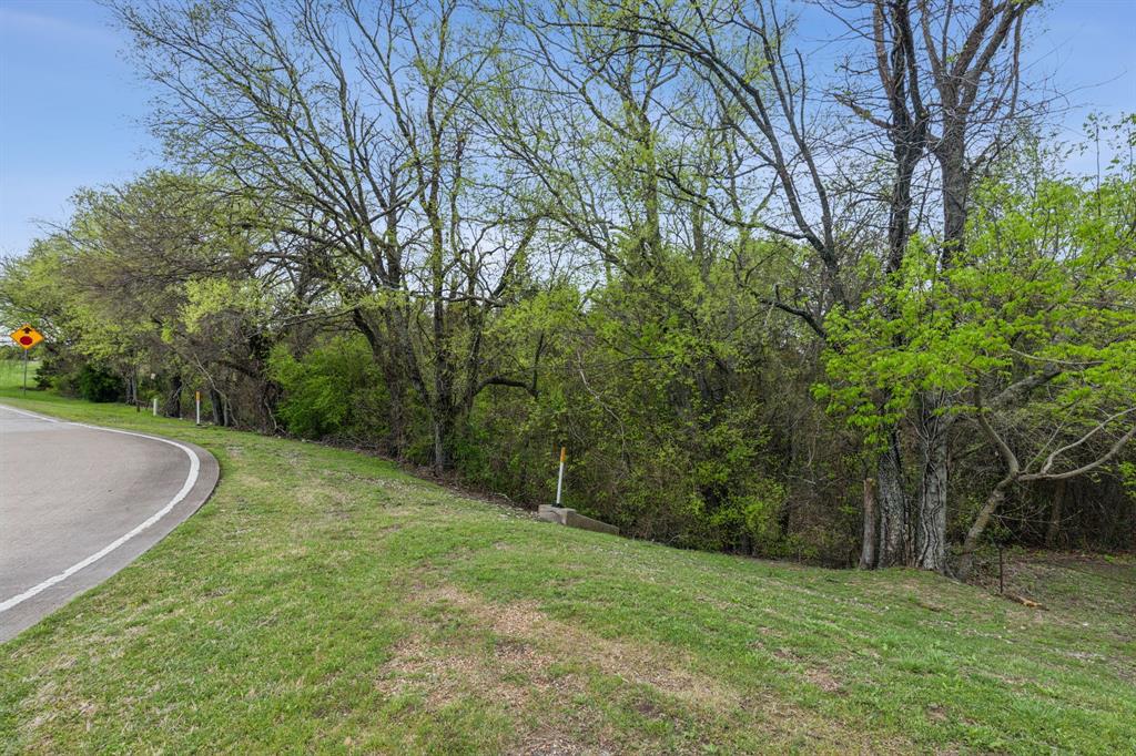 Tbd Old Ridge Road Heath, TX 75032 - Photo 8 of 14 a view of a grassy field with trees