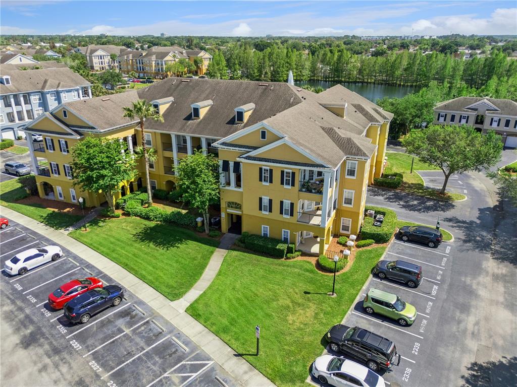 3751 Conroy Road, Unit 2325 Orlando, FL 32839 - Photo 22 of 31 an aerial view of multiple houses with yard