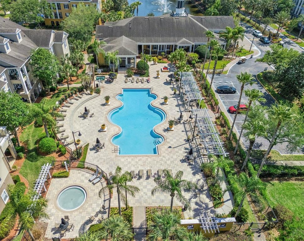 3751 Conroy Road, Unit 2325 Orlando, FL 32839 - Photo 25 of 31 an aerial view of a house with a swimming pool yard and outdoor seating
