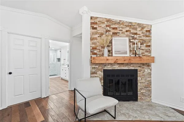 a bathroom with a double vanity sink mirror and shower