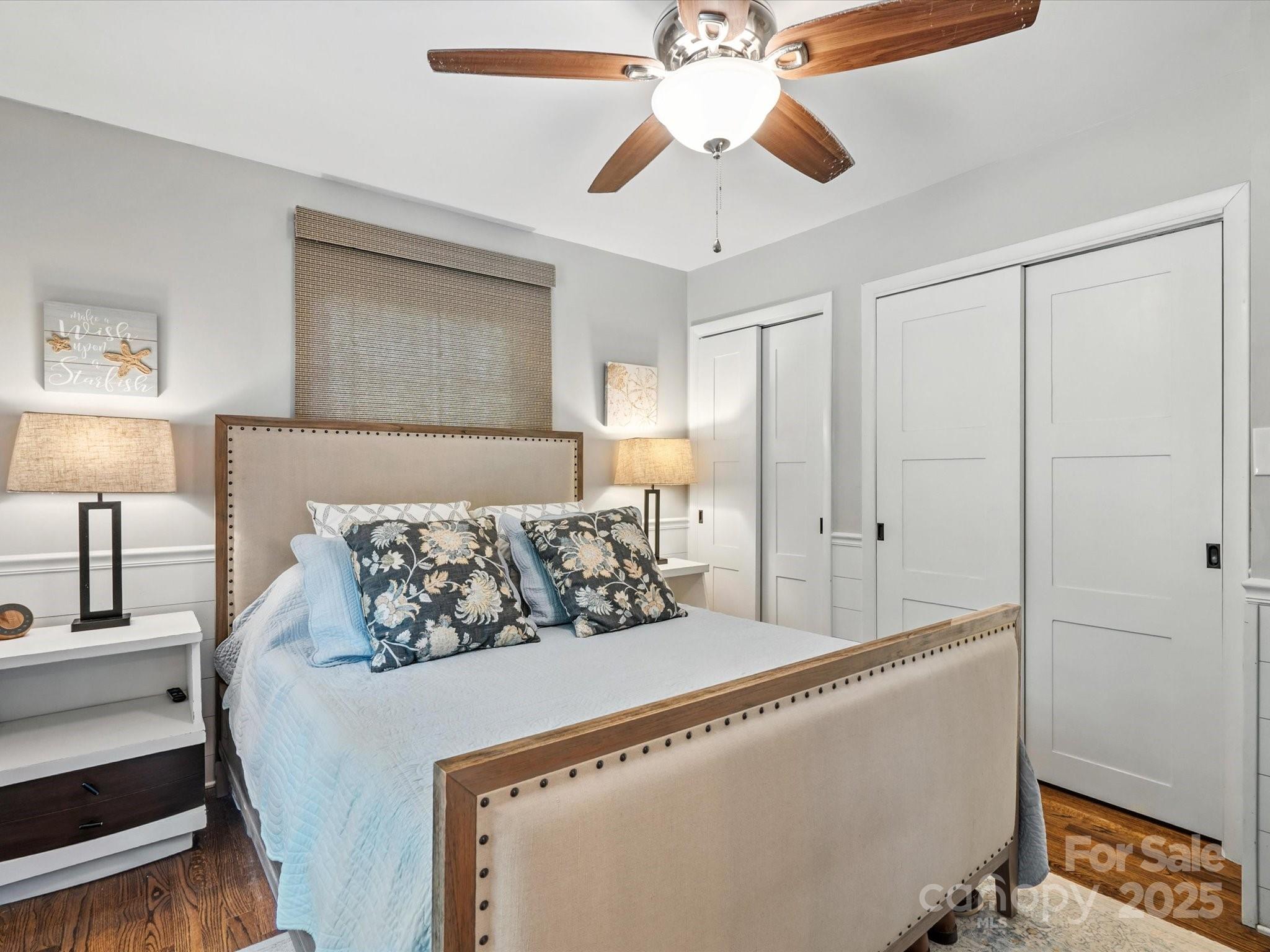102 Ridge Avenue Clover, SC 29710 - Photo 28 of 48 a bed room with a bed and a lamp
