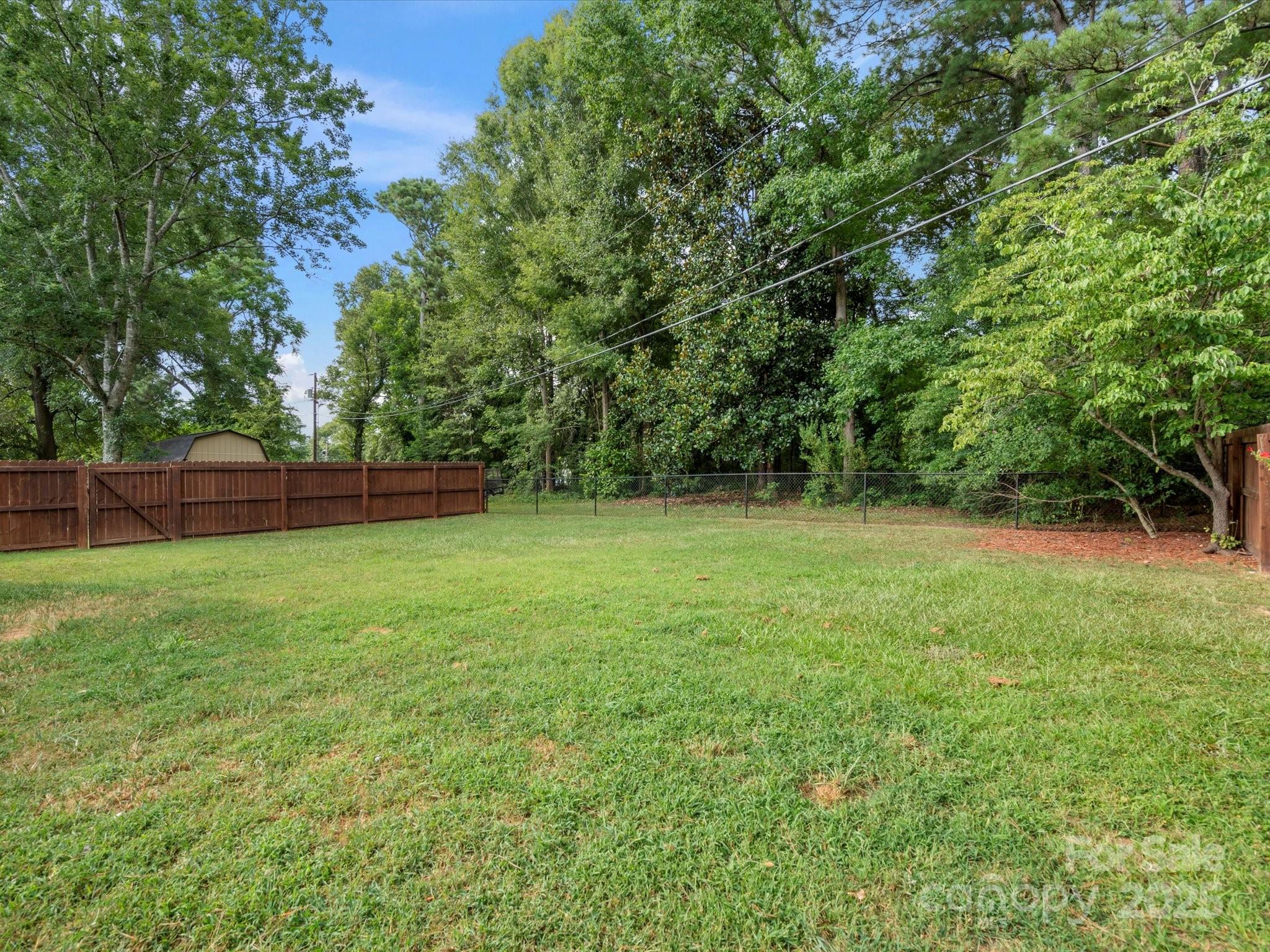102 Ridge Avenue Clover, SC 29710 - Photo 44 of 48 a view of outdoor space with deck and yard