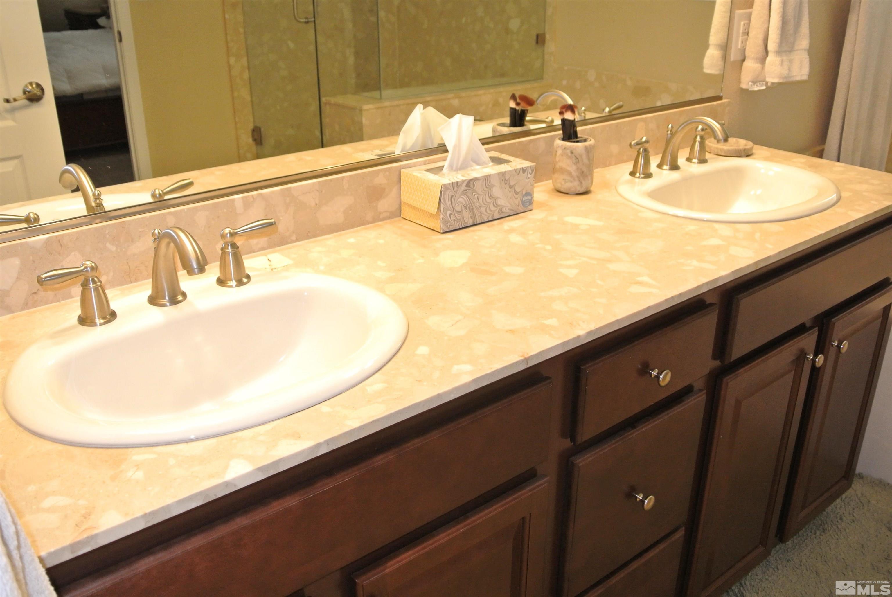 1888 Cholula Drive Reno, NV 89521 - Photo 9 of 17 a bathroom with a sink and a mirror