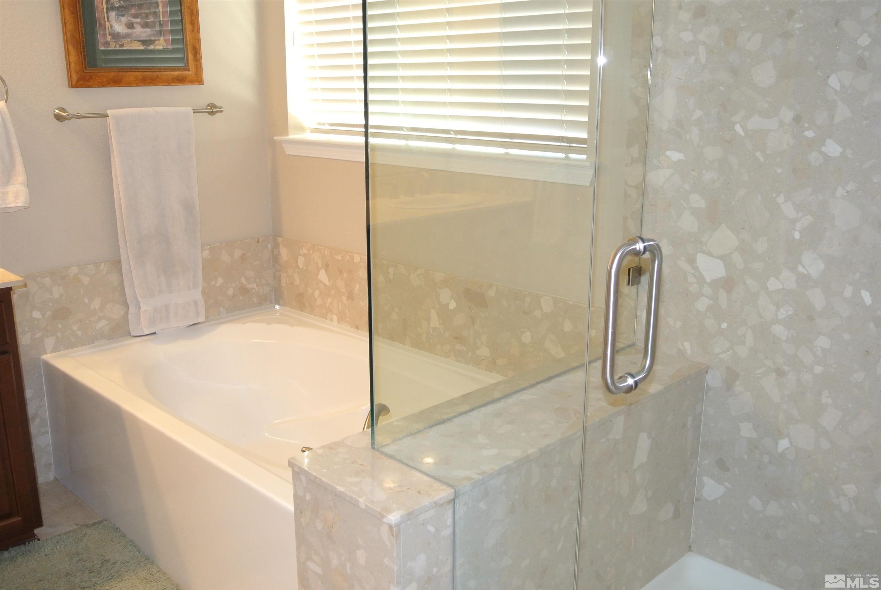 1888 Cholula Drive Reno, NV 89521 - Photo 10 of 17 a bathroom with a bathtub