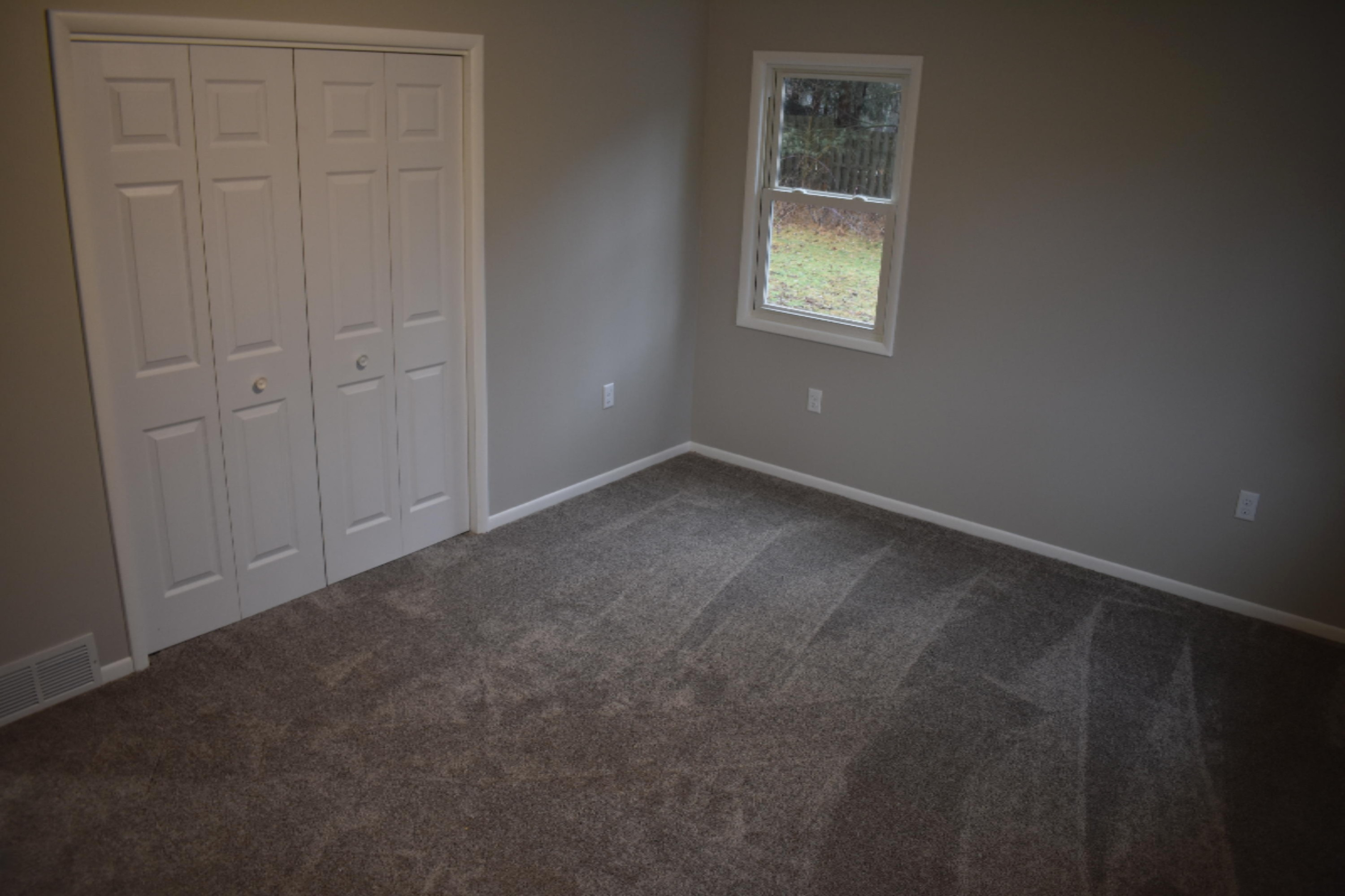236 10 Mile Road Northwest Sparta, MI 49345 - Photo 20 of 23 Main Level Bedroom