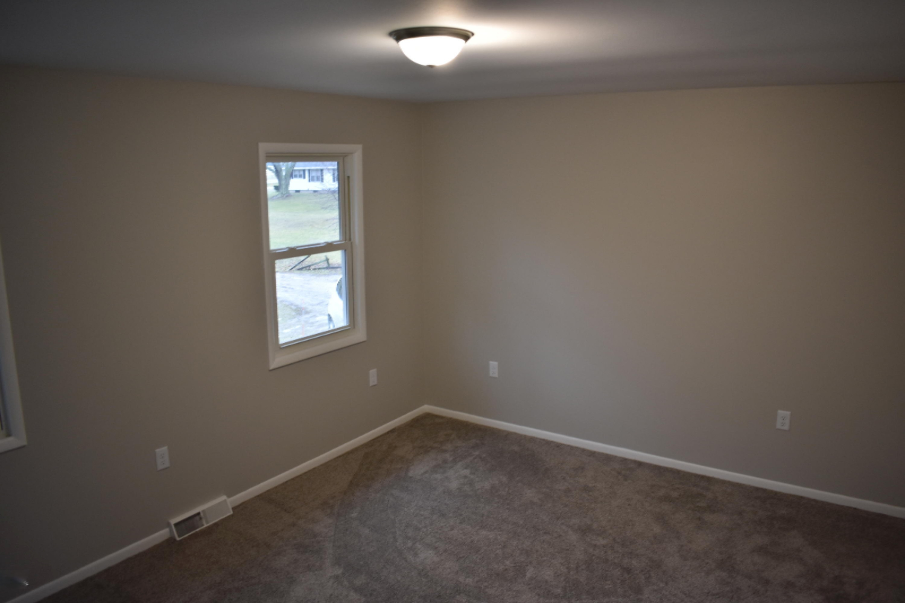 236 10 Mile Road Northwest Sparta, MI 49345 - Photo 22 of 23 Bedroom 2 main level