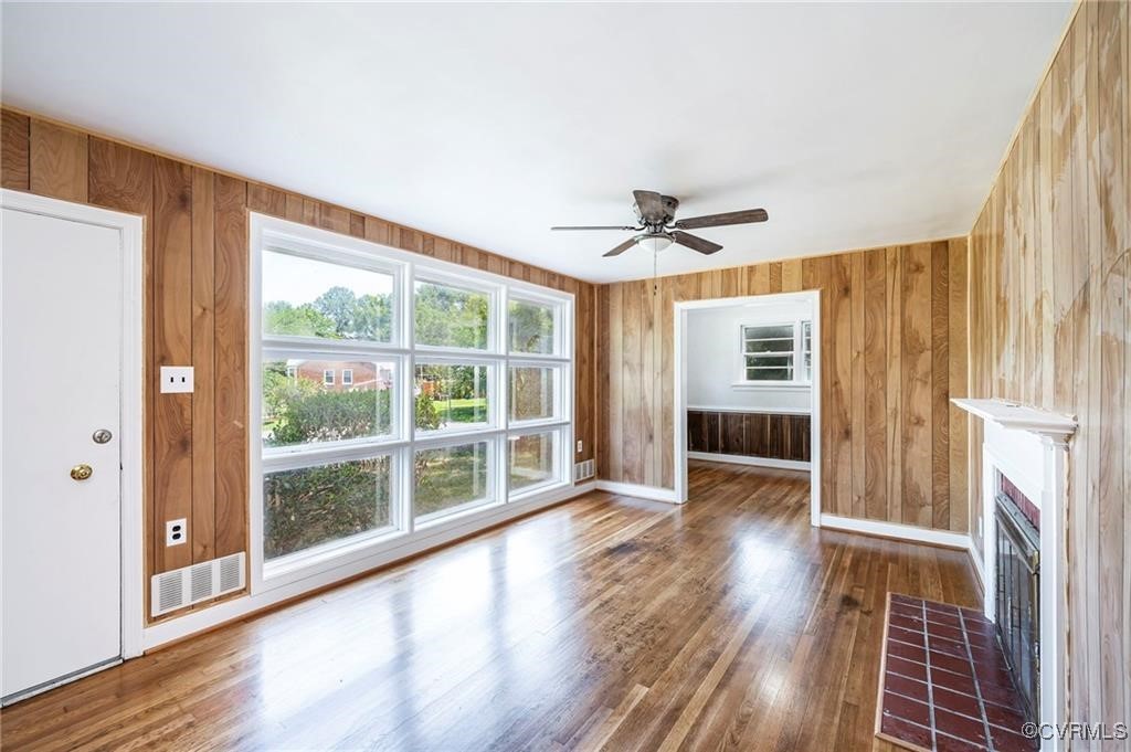 1215 Rosecroft Road Henrico, VA 23229 - Photo 21 of 22 wooden floor in an empty room with a window