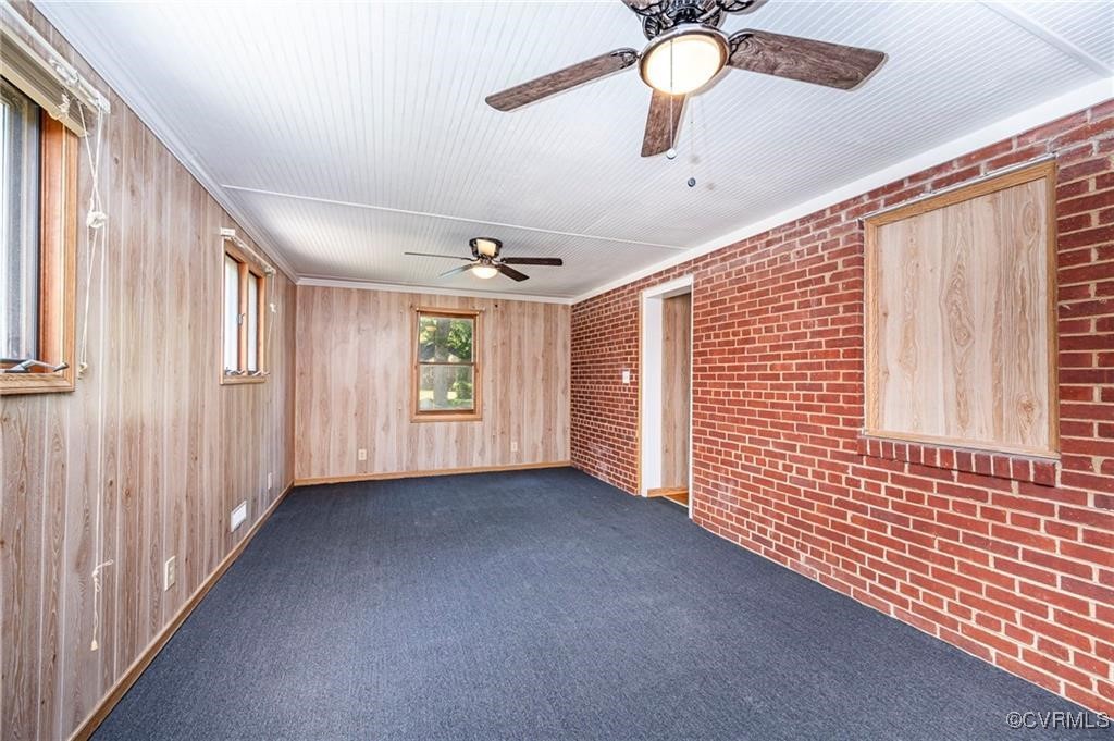 1215 Rosecroft Road Henrico, VA 23229 - Photo 4 of 22 a view of a livingroom with a ceiling fan and window