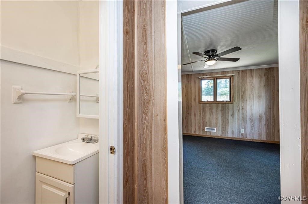 1215 Rosecroft Road Henrico, VA 23229 - Photo 9 of 22 a view of a utility room with closet cabinet