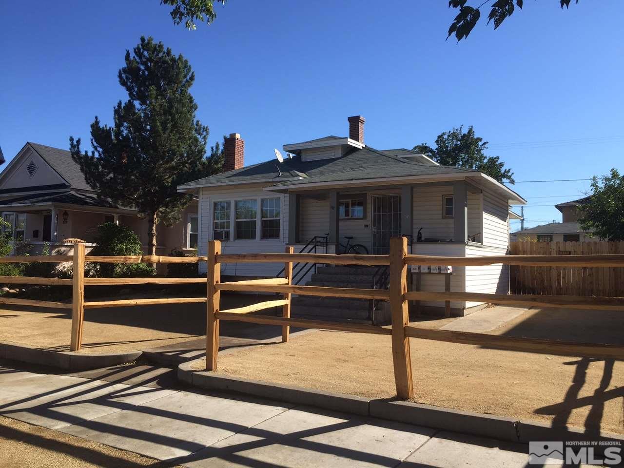 820 Holcomb Avenue Reno, NV 89502 - Photo 1 of 1 a front view of a house with a porch