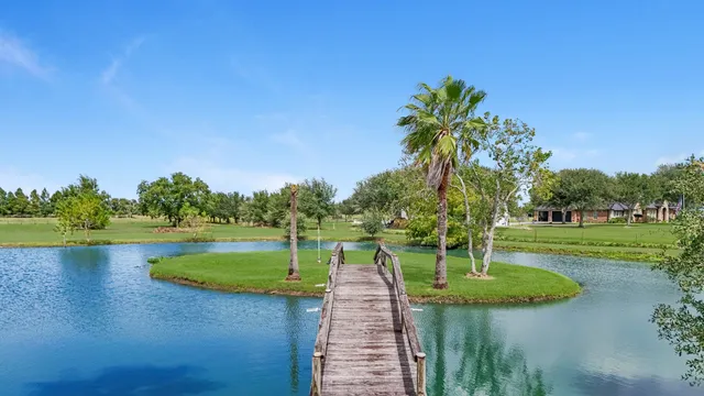 a view of a park with a lake view
