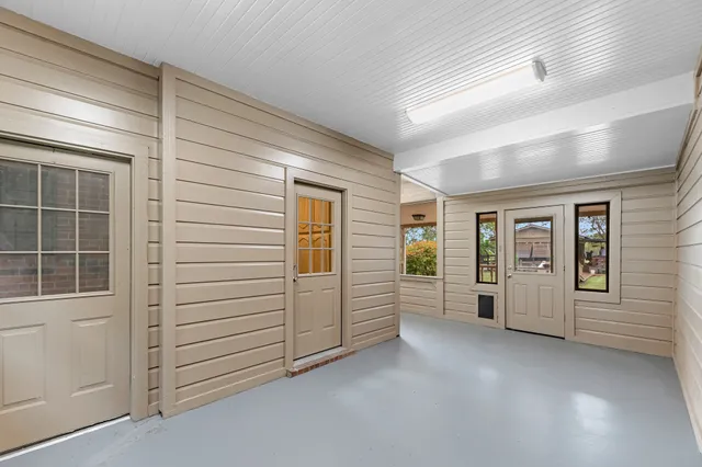 an empty room with windows