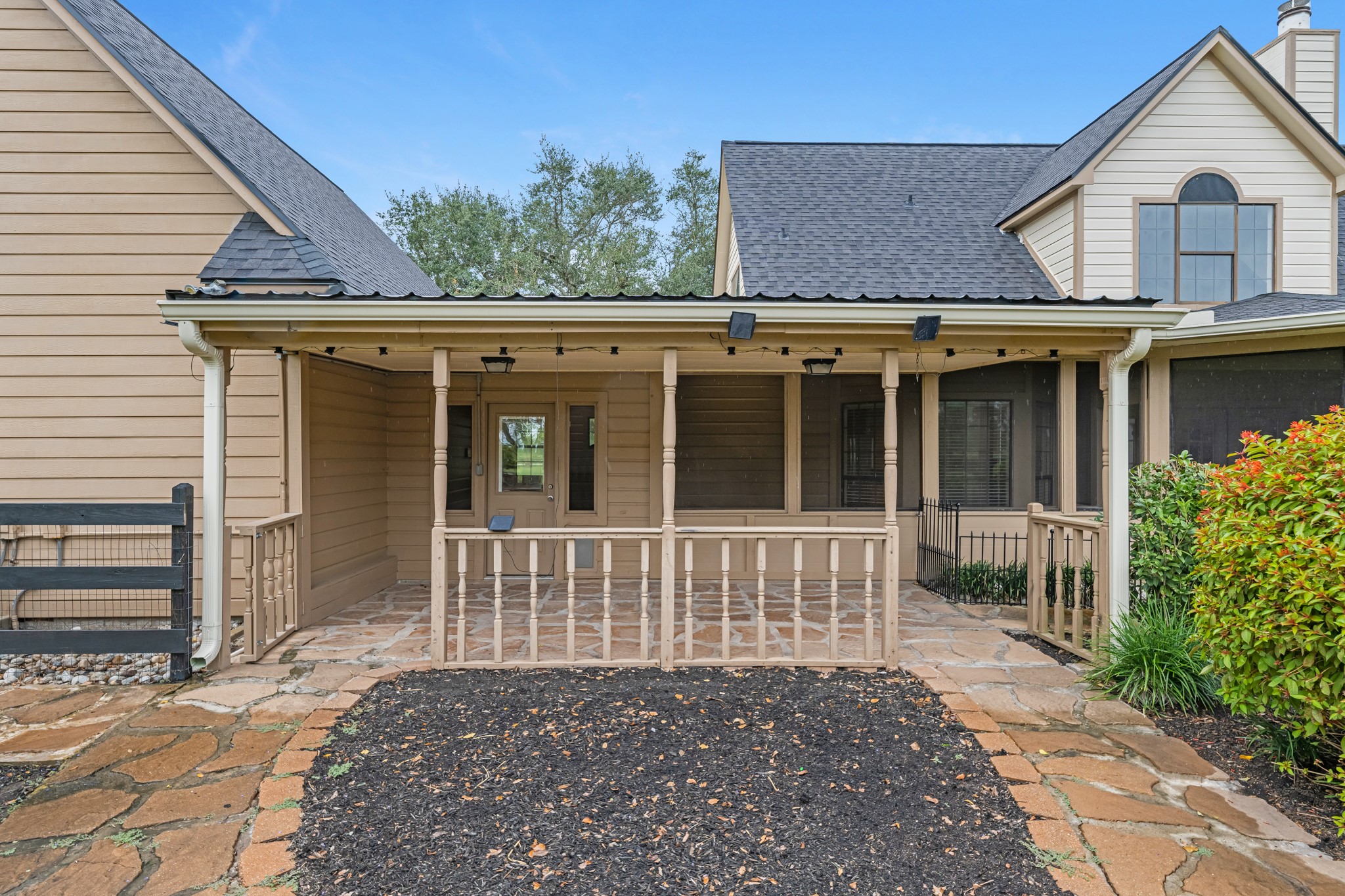 24849 County Road 48 Angleton, TX 77515 - Photo 33 of 48 a view of a house with a small yard and wooden floor and fence
