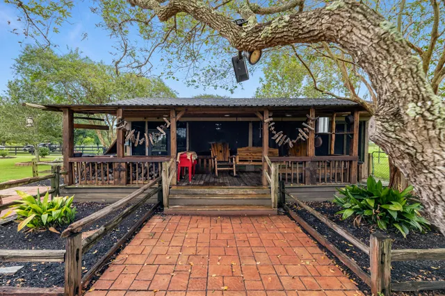 a view of a patio with chairs in patio