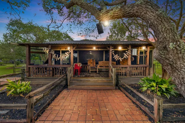 a view of a chairs and tables in the patio