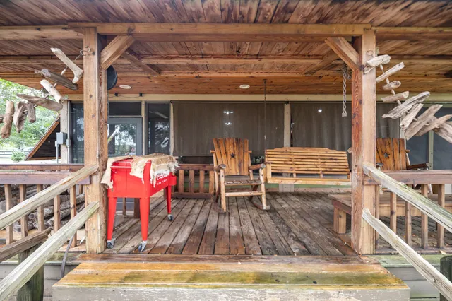 a view of swimming pool with seating space