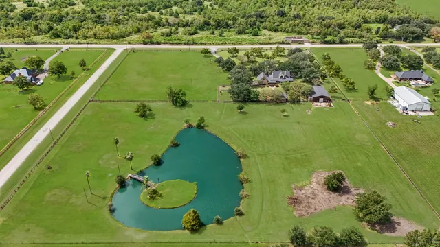 view of a lake with a yard