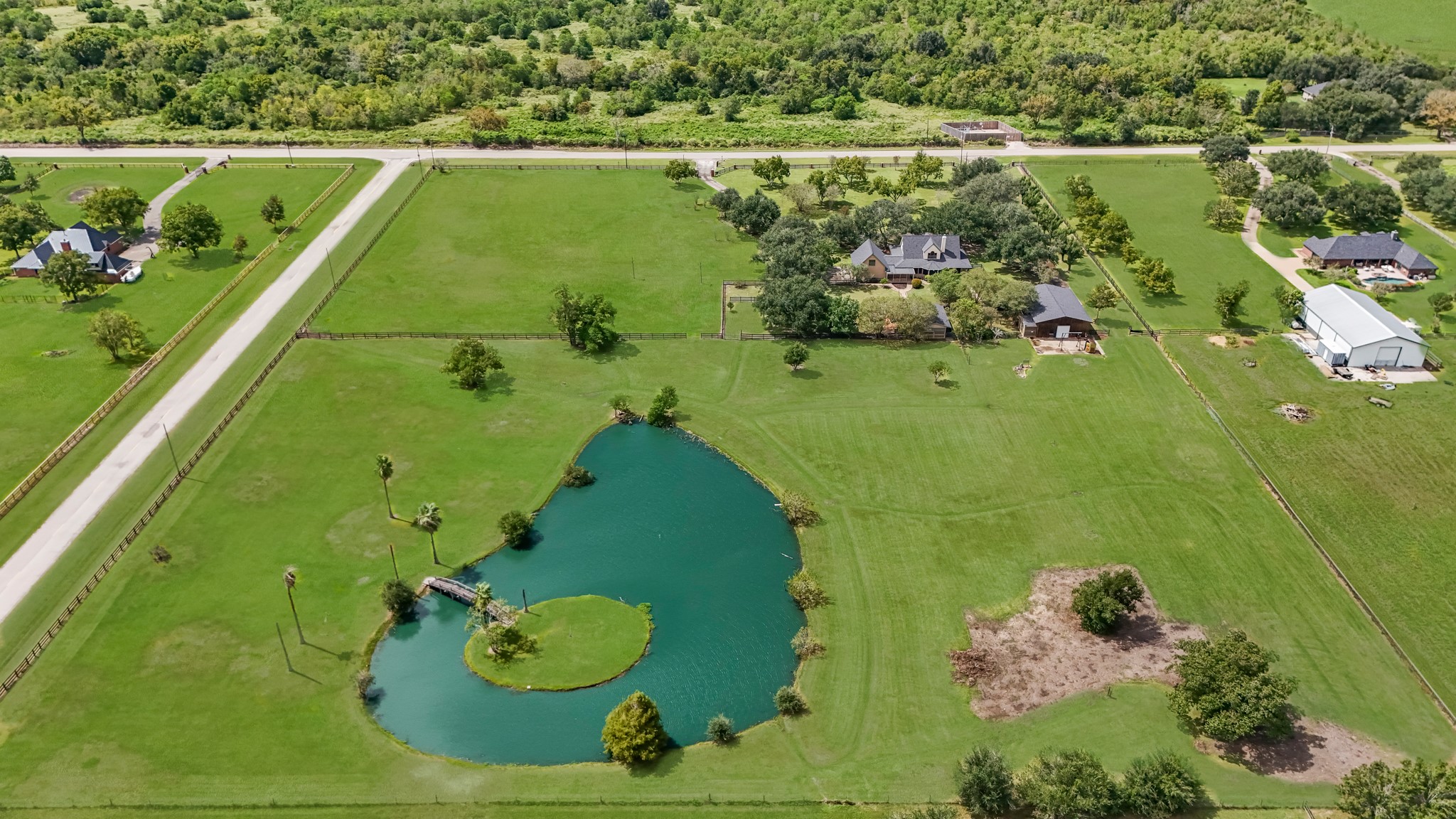 24849 County Road 48 Angleton, TX 77515 - Photo 6 of 48 view of a lake with a yard