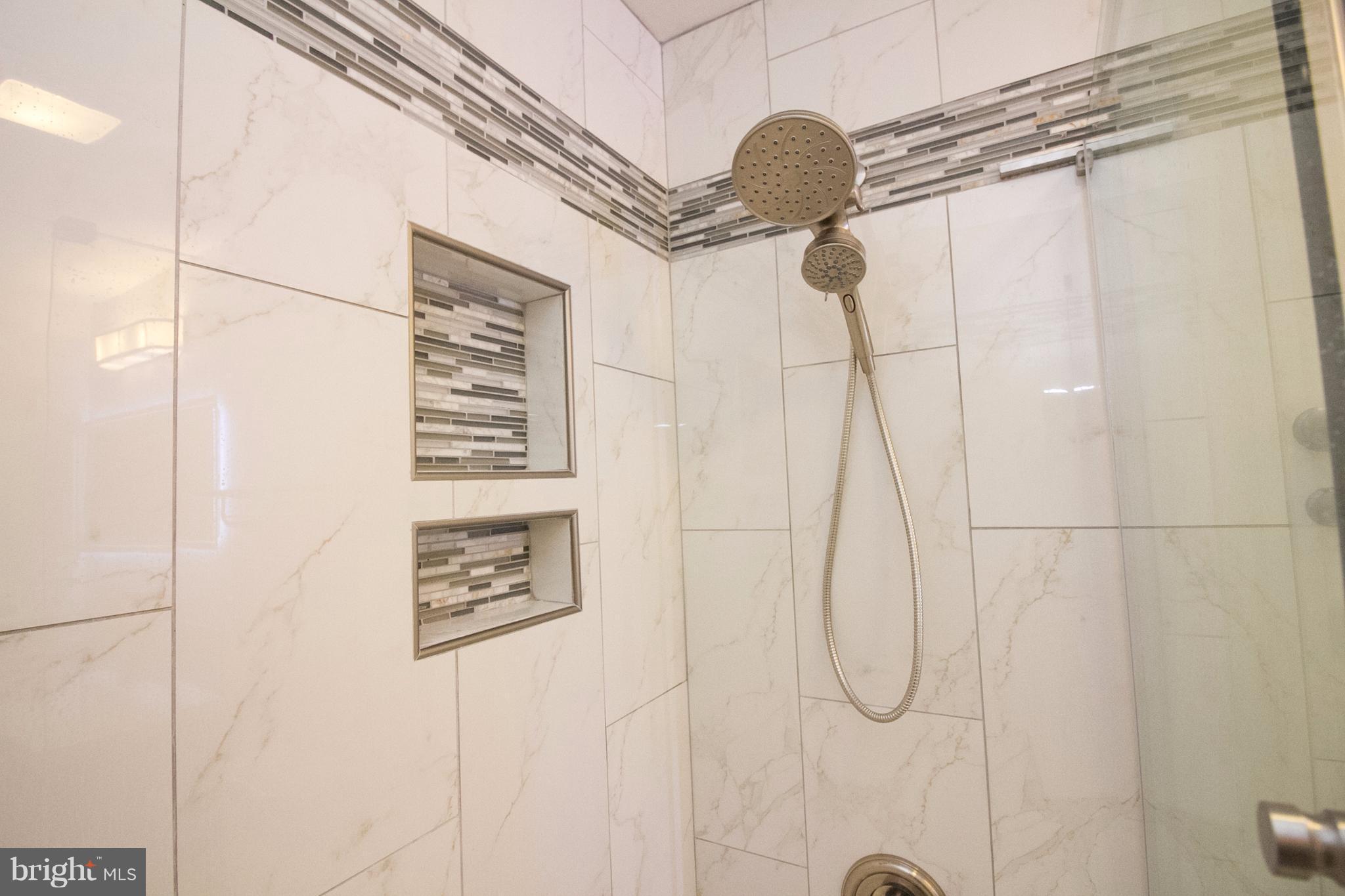 304 East 5th Avenue Ranson, WV 25438 - Photo 13 of 23 Tile shelf with large shower head