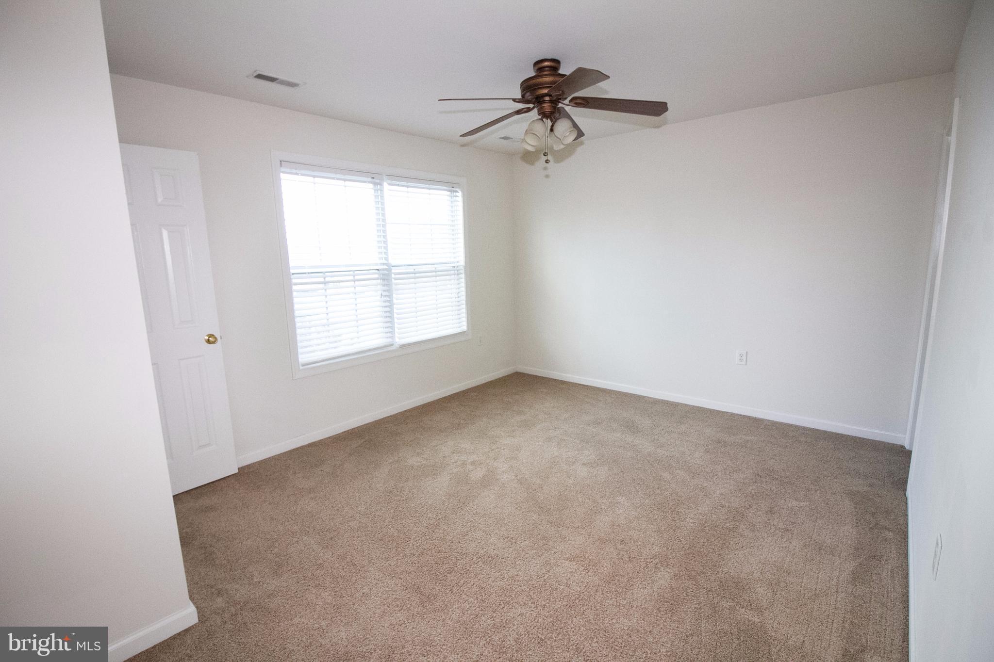 304 East 5th Avenue Ranson, WV 25438 - Photo 15 of 23 Master bedroom with walk in closet