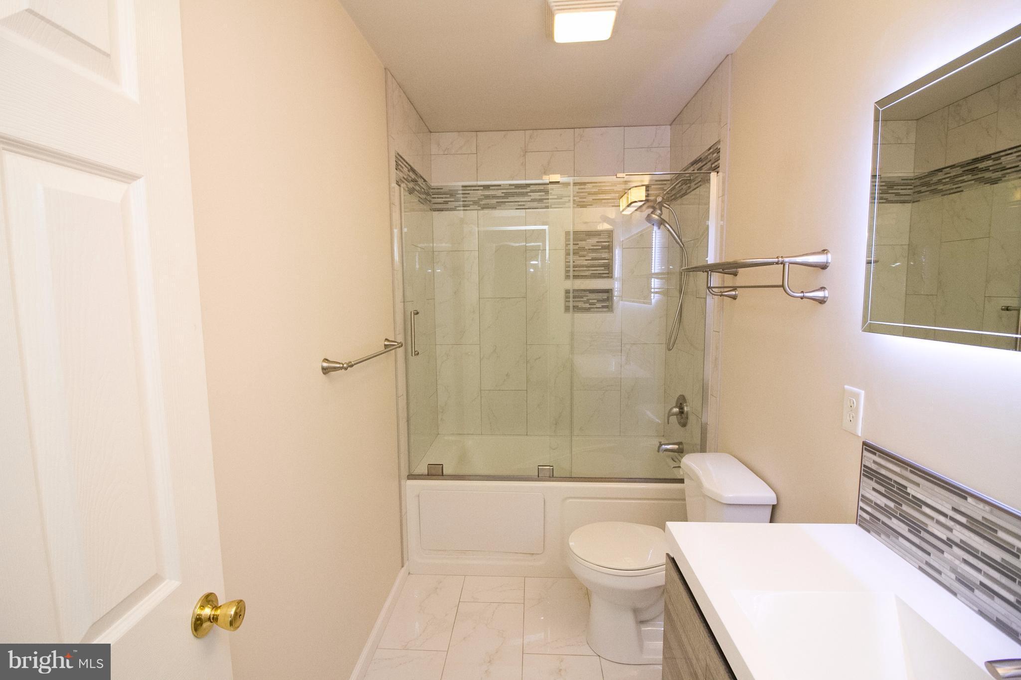 304 East 5th Avenue Ranson, WV 25438 - Photo 10 of 23 This master bathroom will impress you...