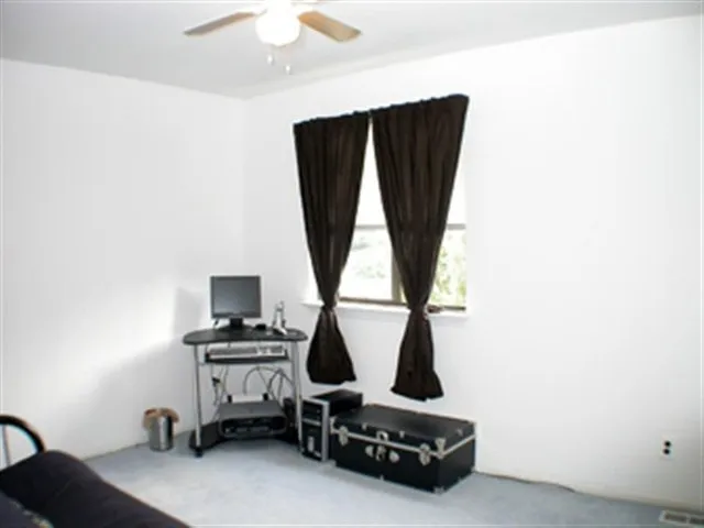 a view of room with gym equipment