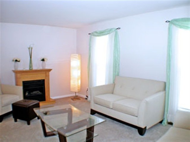 36 Pheasant Drive Sicklerville, NJ 08081 - Photo 7 of 9 a living room with furniture and a fireplace