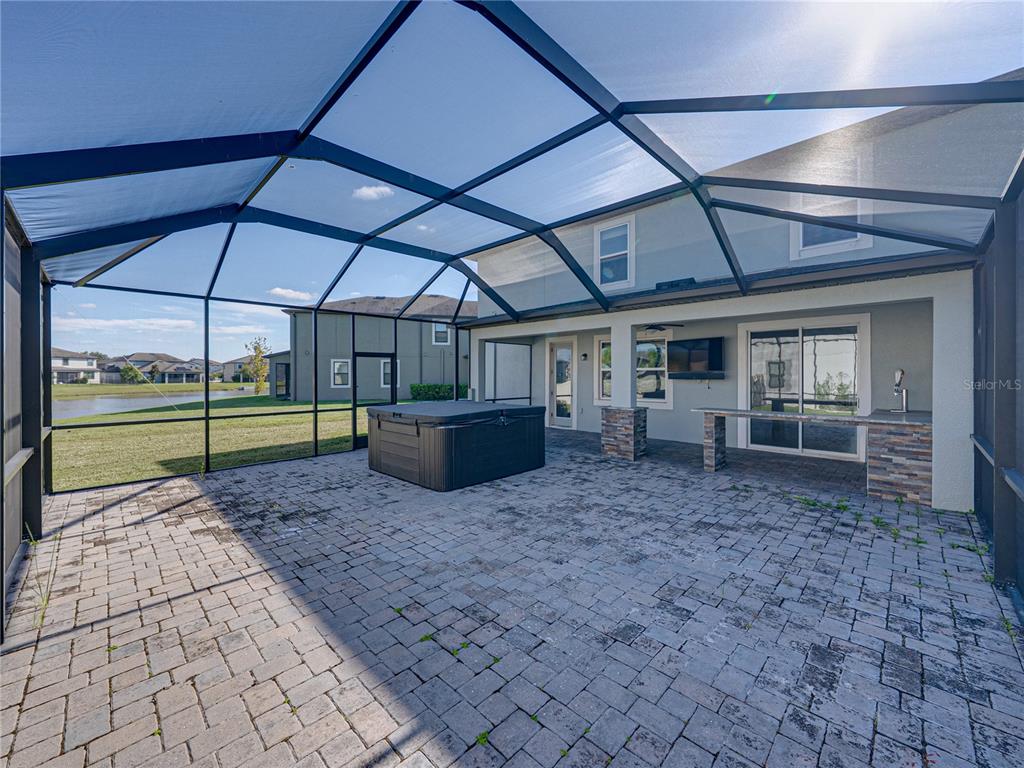 7628 Surf Reed Way Wesley Chapel, FL 33545 - Photo 56 of 76 a view of a backyard