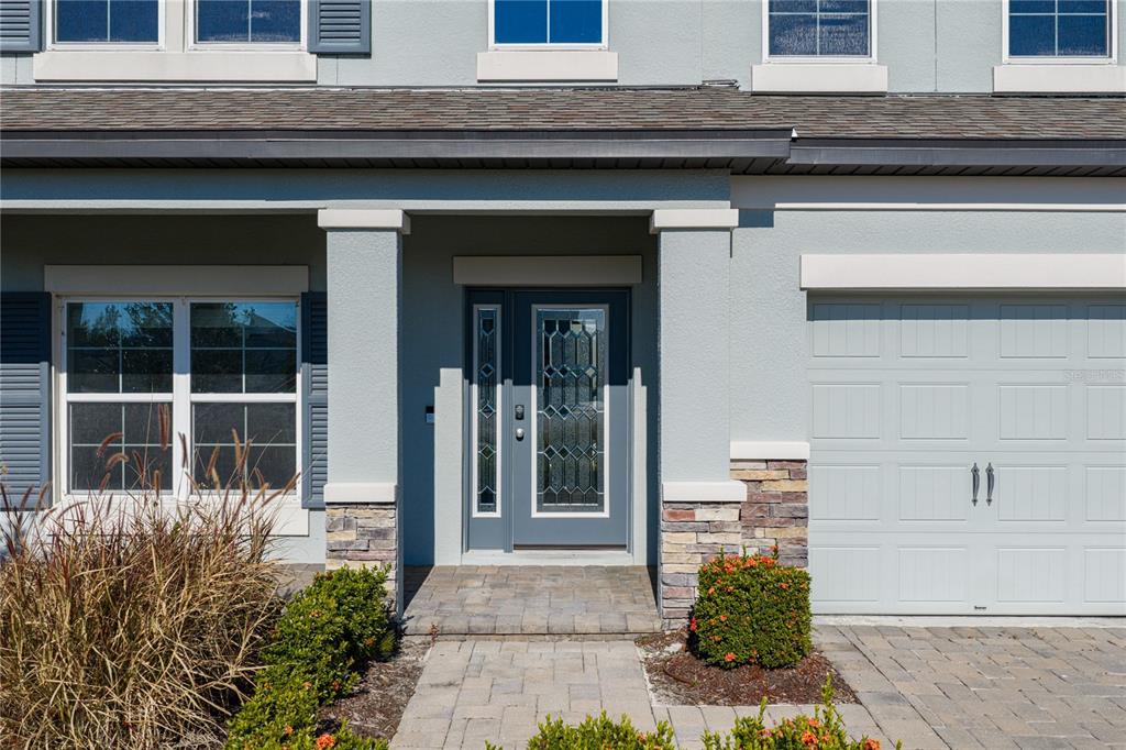 7628 Surf Reed Way Wesley Chapel, FL 33545 - Photo 6 of 76 a house with a outdoor space