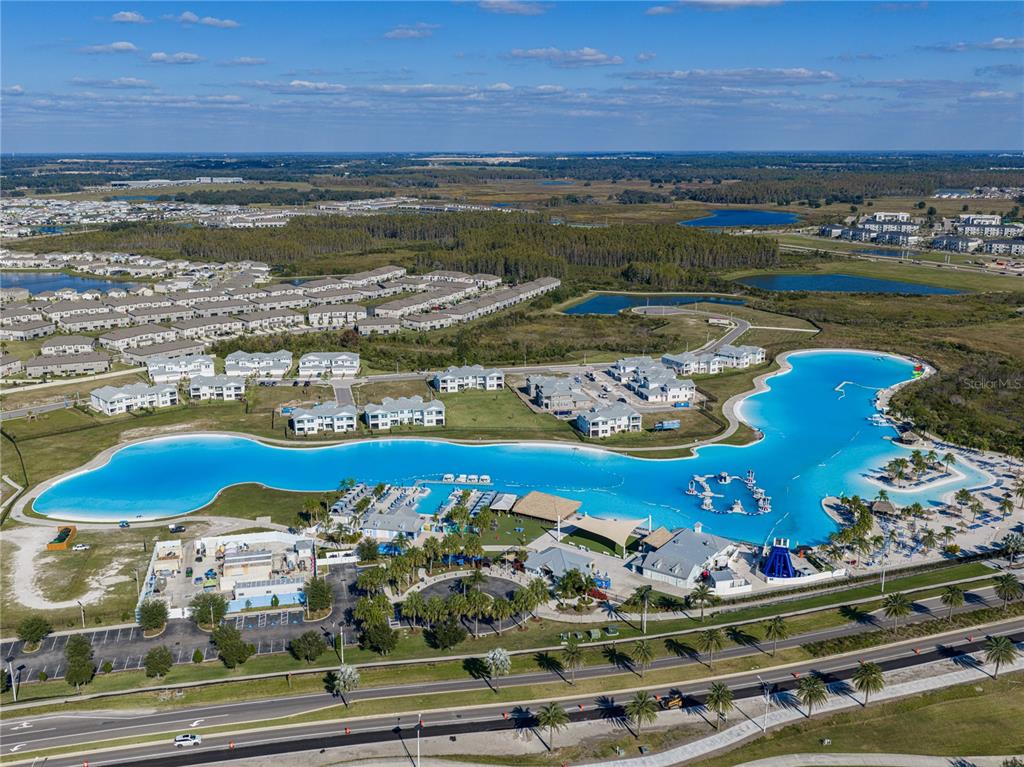 7628 Surf Reed Way Wesley Chapel, FL 33545 - Photo 62 of 76 a view of a room with an ocean view