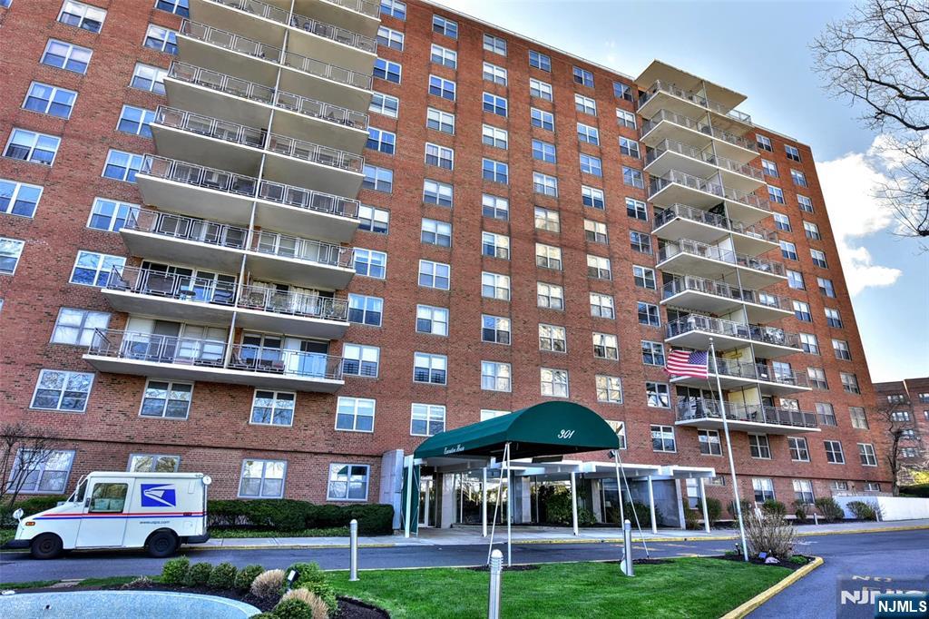 301 Beech Street, Unit 2F Hackensack, NJ 07601 - Photo 1 of 21 a view of building with yard