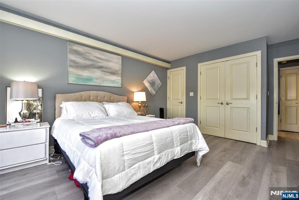 301 Beech Street, Unit 2F Hackensack, NJ 07601 - Photo 16 of 21 a bedroom with a bed and a window