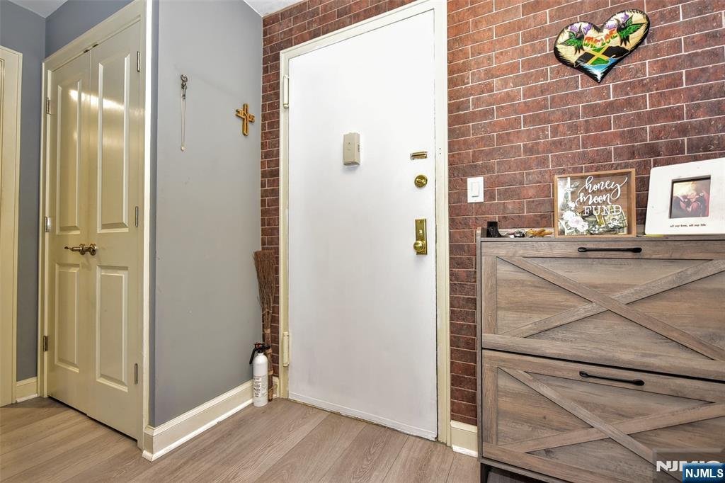 301 Beech Street, Unit 2F Hackensack, NJ 07601 - Photo 3 of 21 a view of a hallway with interior of the house